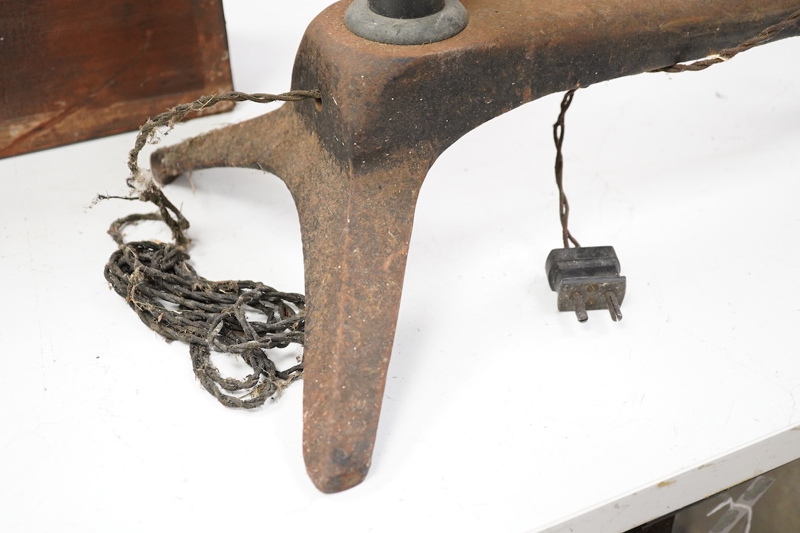 An early 20th century ophthalmic keratometer, designed to allow opticians to establish the curvature of a patient’s eye, constructed of cast-iron, brass and tin, and fitted with electric lamps and early celluloid scales,